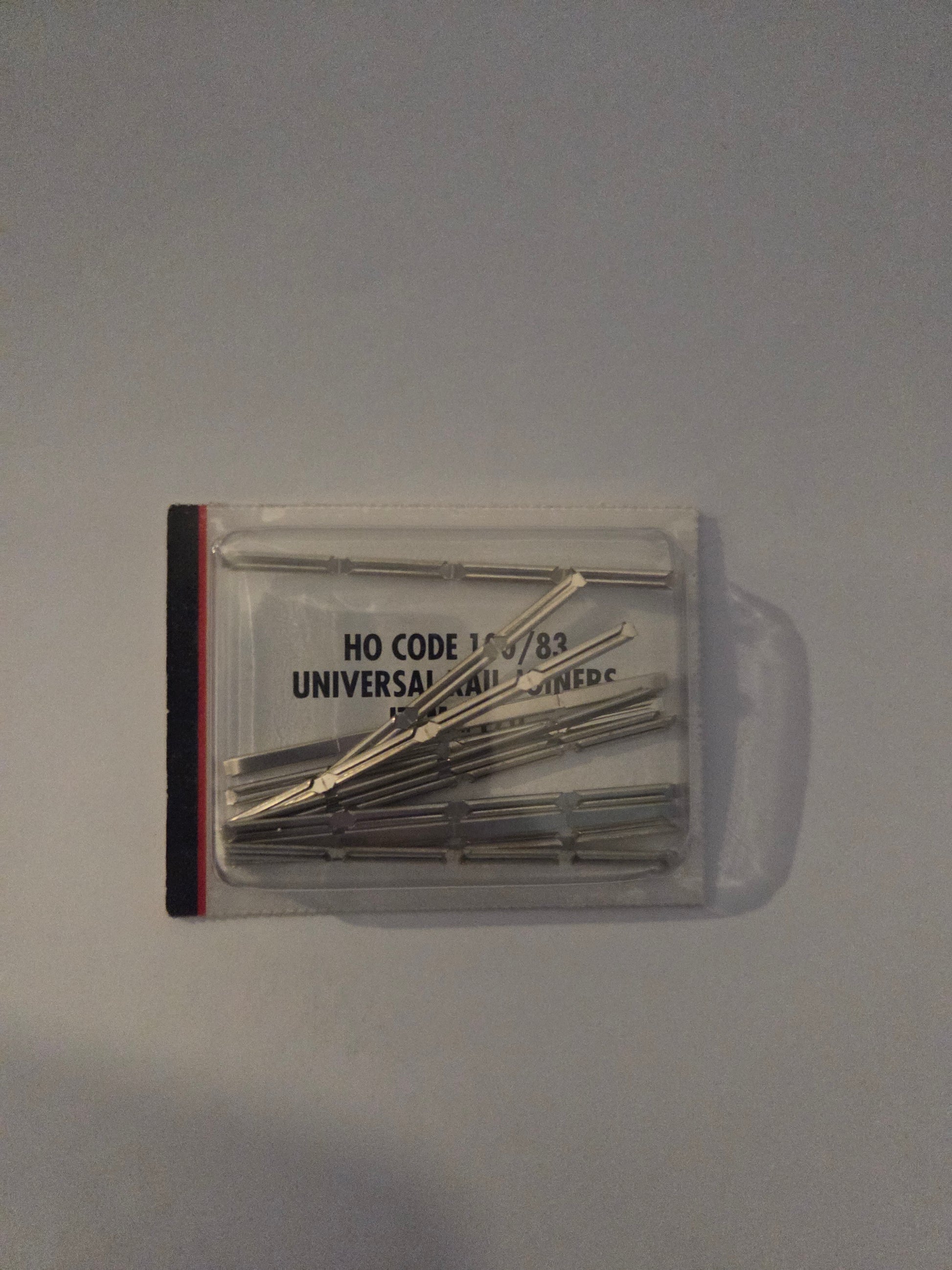 HO scale model railroad track - Atlas HO 170 Track Universal Rail Joiners Nickel-Silver (for Code 100 or Code 83 Rail) pkg(48)